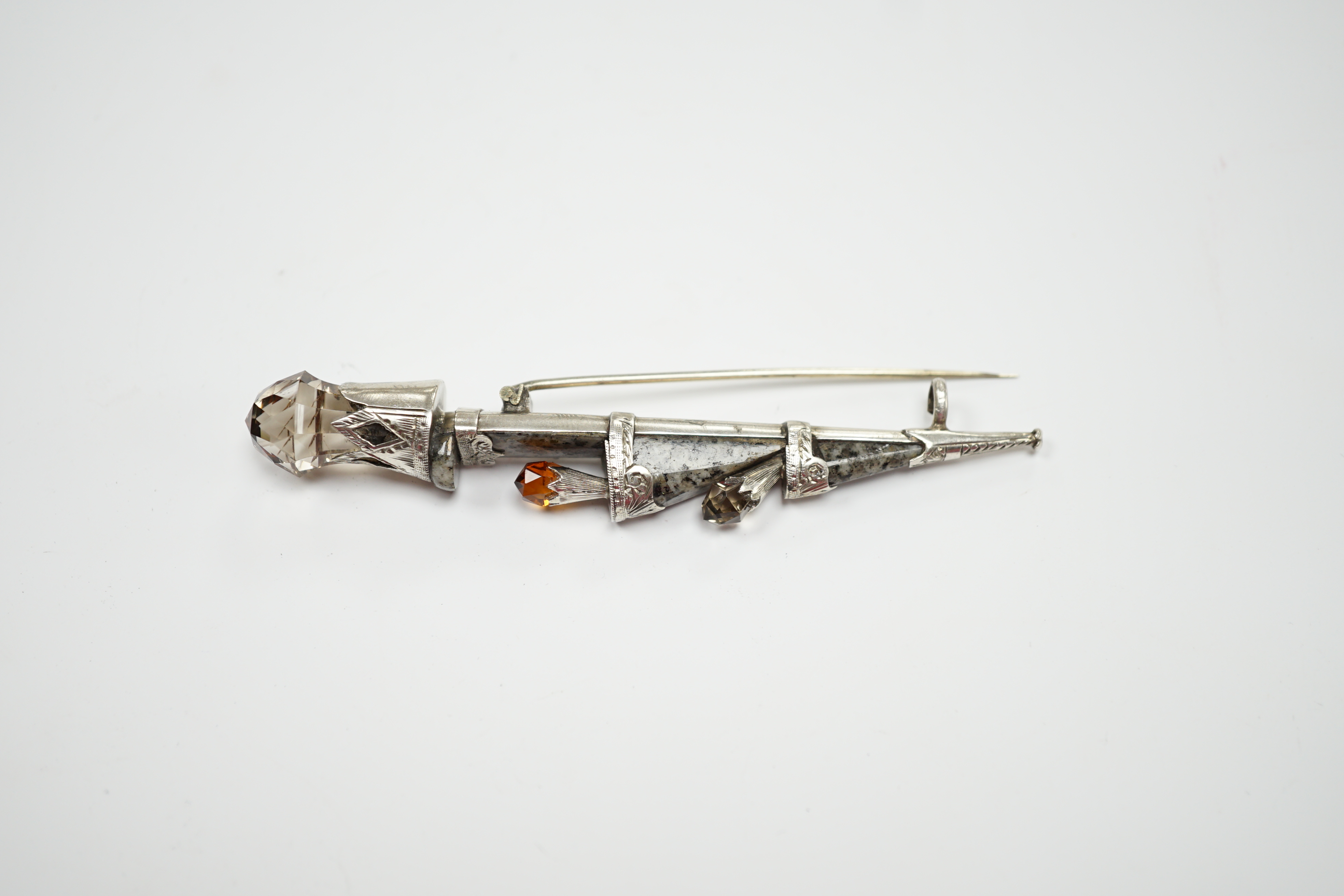 A white metal, Scottish hardstone and gem set dirk brooch, 94mm.